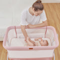Baby Bassinet Bedside Crib with Mattress & Sheet, 4-Sided Mesh, Pink I986